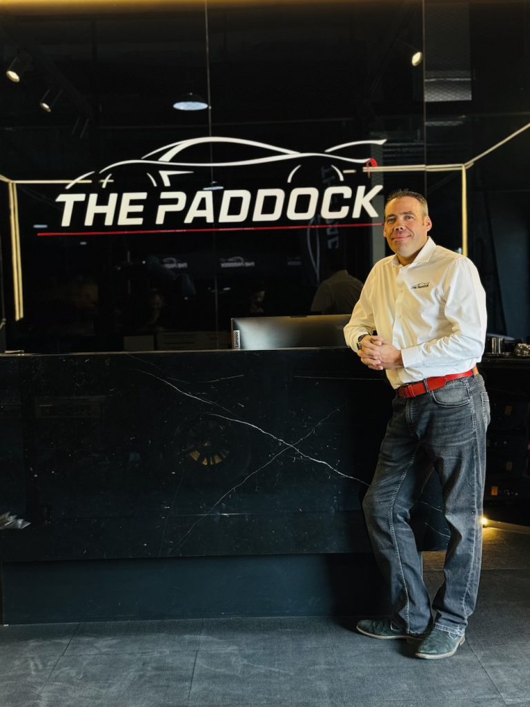 THE PADDOCK: WHERE AUTOMOTIVE EXCELLENCE MEETS PASSION – A CONVERSATION WITH FOUNDER JOHN MOFFATT